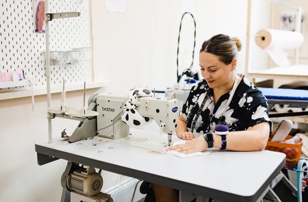 Fashion designer goes back to bridalwear  with launch of new business in time for top independent wedding show