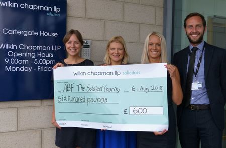 Dress down fundraiser at region’s leading legal firm supports vital soldiers’ charity