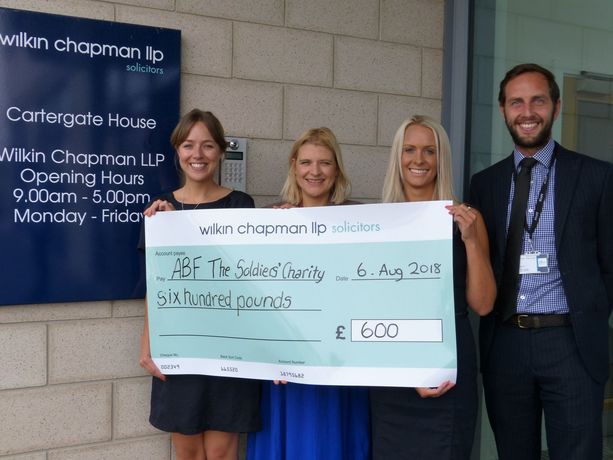 Dress down fundraiser at region’s leading legal firm supports vital soldiers’ charity