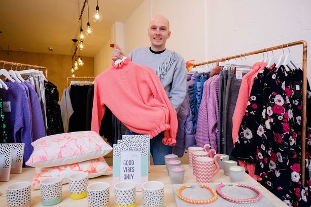 Designer brings flair for fashion to Fruit Market